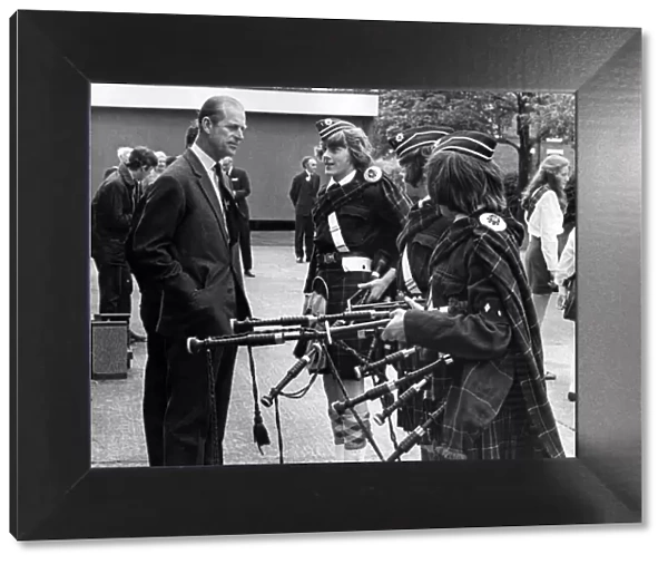 Prince Philip, Duke of Edinburgh, North West visits. The Duke chats to three pipers of