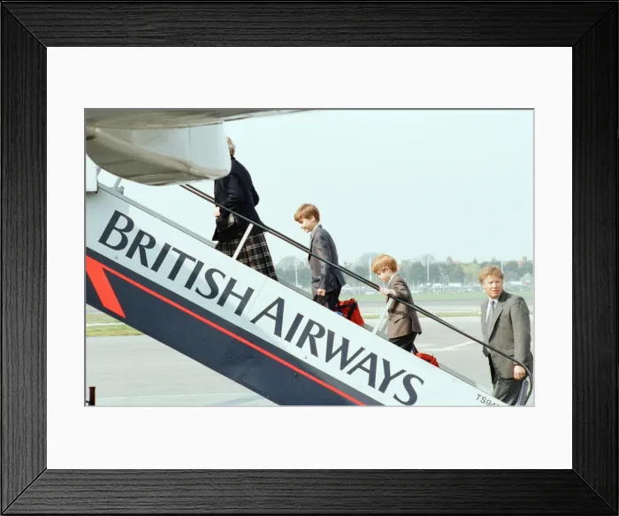 Framed Print : Prince William and Prince Harry board aircraft at London Heathrow Airport