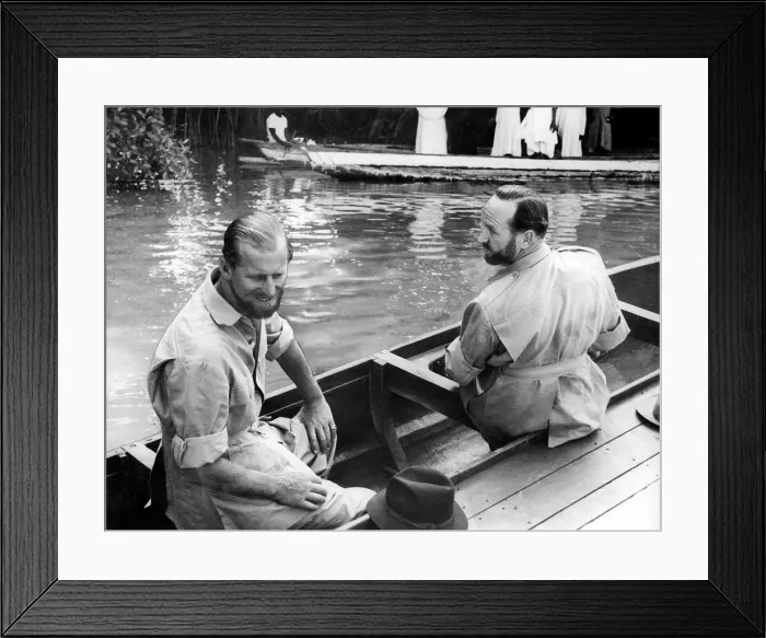 Framed Print : The Duke of Edinburgh Feb 1957 and Lt. Commander Michael Parker in a canoe at Gambia Framed Print : The Duke of Edinburgh Feb 1957 and Lt. Commander Michael Parker in a canoe at Gambia