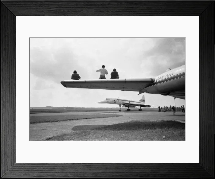 Framed Print : On a fine August day in 1977, Concorde 101 touches down at her final home at Duxford Framed Print : On a fine August day in 1977, Concorde 101 touches down at her final home at Duxford
