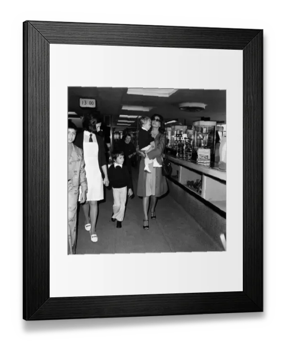 Framed Print : Italian actress Sophia Loren and her two children leaving Heathrow Airport for Rome