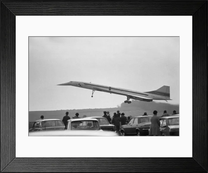 Framed Print : On a fine August day in 1977, Concorde 101 touches down at her final home at Duxford