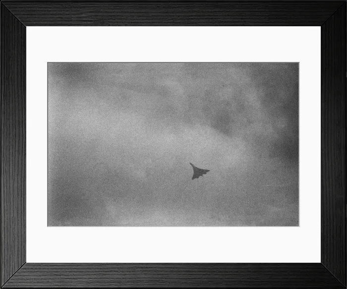 Framed Print : On a fine August day in 1977, Concorde 101 touches down at her final home at Duxford