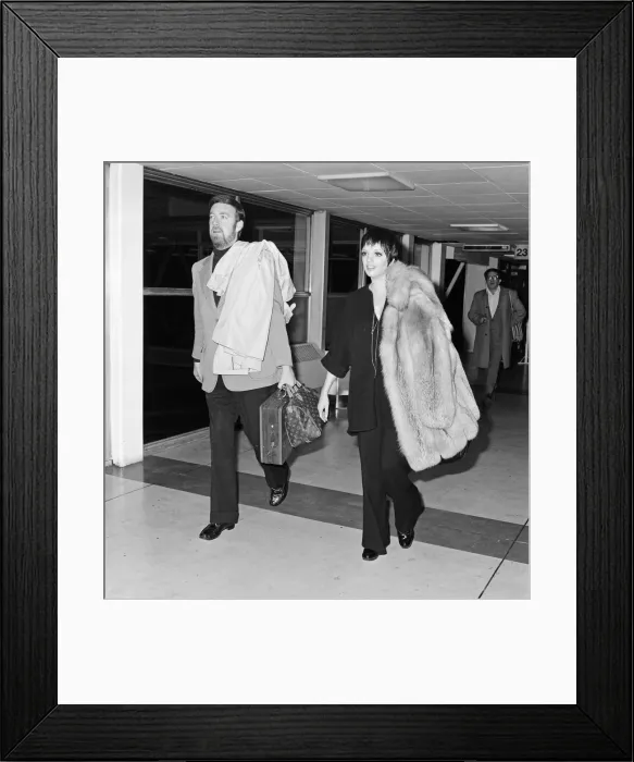 Framed Print : Liza Minnelli and her new husband Jack Haley Jr arrive at Heathrow to finish off their Framed Print : Liza Minnelli and her new husband Jack Haley Jr arrive at Heathrow to finish off their