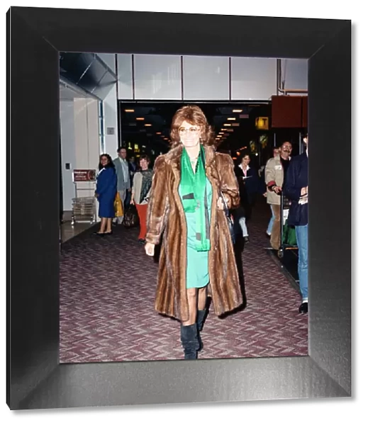 Actress Sophia Loren pictured at London Airport. 27th December 1988
