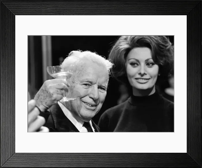 Framed Print : Charlie Chaplin celebrates his 77th birthday on the set at Pinewood where he is making a