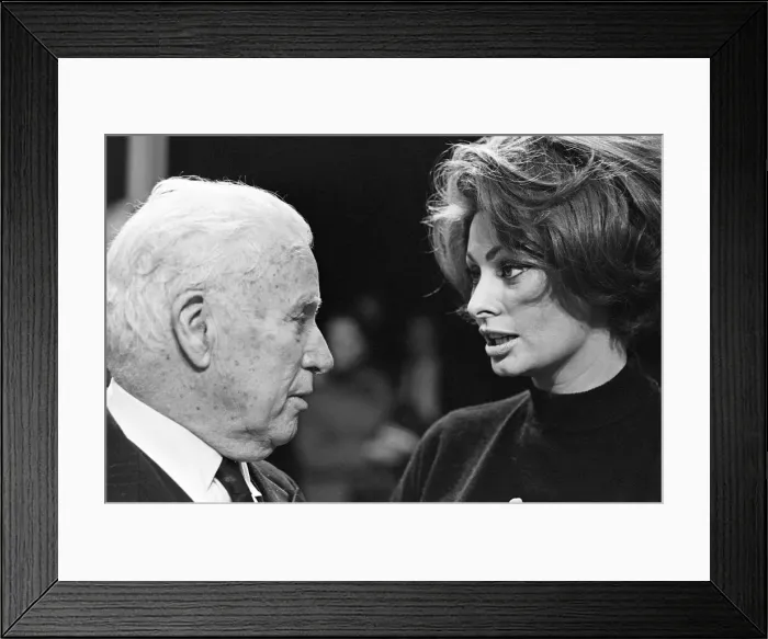 Framed Print : Charlie Chaplin celebrates his 77th birthday on the set at Pinewood where he is making a Framed Print : Charlie Chaplin celebrates his 77th birthday on the set at Pinewood where he is making a