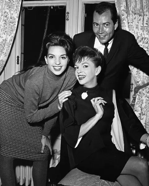 Liza Minnelli, 18, is pictured with her mother Judy Garland, 42, and Mark Herron