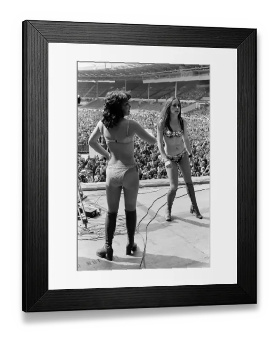 Framed Print : Two women on stage at the London Rock and Roll Show at Wembley Stadium, London Framed Print : Two women on stage at the London Rock and Roll Show at Wembley Stadium, London