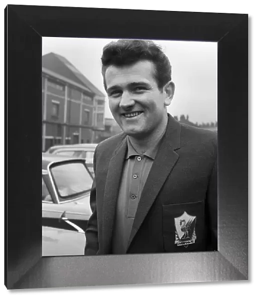 Liverpool goalkeeper Tommy Lawrence shows off his new suit ahead of the team