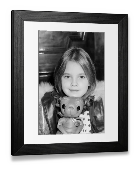Framed Print : Seven year old child actress Drew Barrymore, the young star of the film E. T