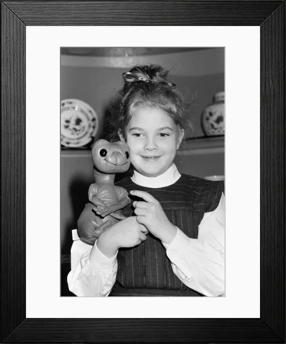Framed Print : Seven year old child actress Drew Barrymore, the young star of the film E. T Framed Print : Seven year old child actress Drew Barrymore, the young star of the film E. T