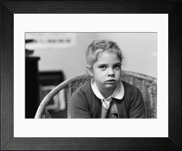 Framed Print : Seven year old child actress Drew Barrymore, the young star of the film E. T Framed Print : Seven year old child actress Drew Barrymore, the young star of the film E. T