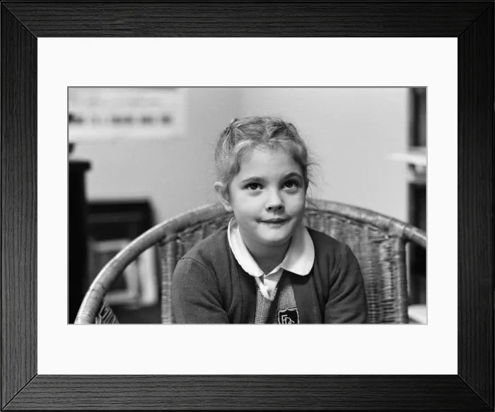 Framed Print : Seven year old child actress Drew Barrymore, the young star of the film E. T Framed Print : Seven year old child actress Drew Barrymore, the young star of the film E. T