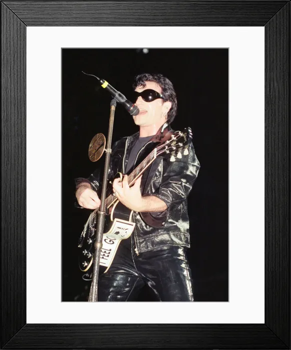 Framed Print : U2 in concert on the Zoo TV Tour, Wembley Stadium. Bono performing on stage Framed Print : U2 in concert on the Zoo TV Tour, Wembley Stadium. Bono performing on stage