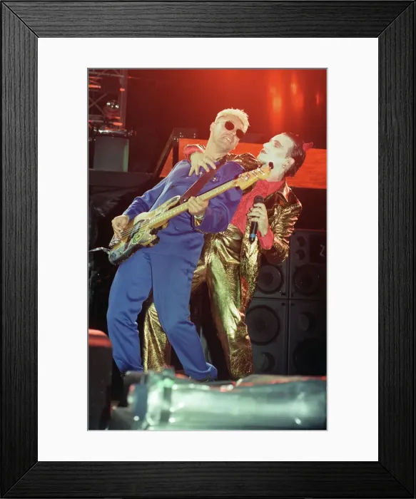 Framed Print : U2 in concert on the Zoo TV Tour, Wembley Stadium. Bono performing on stage Framed Print : U2 in concert on the Zoo TV Tour, Wembley Stadium. Bono performing on stage