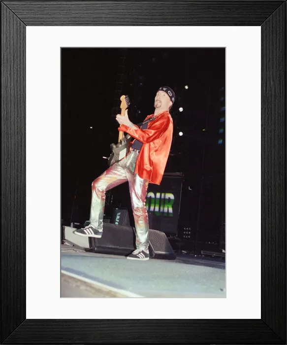 Framed Print : U2 in concert, Zoo TV Tour, Wembley Stadium. The Edge pictured on stage. 11th August 1993 Framed Print : U2 in concert, Zoo TV Tour, Wembley Stadium. The Edge pictured on stage. 11th August 1993