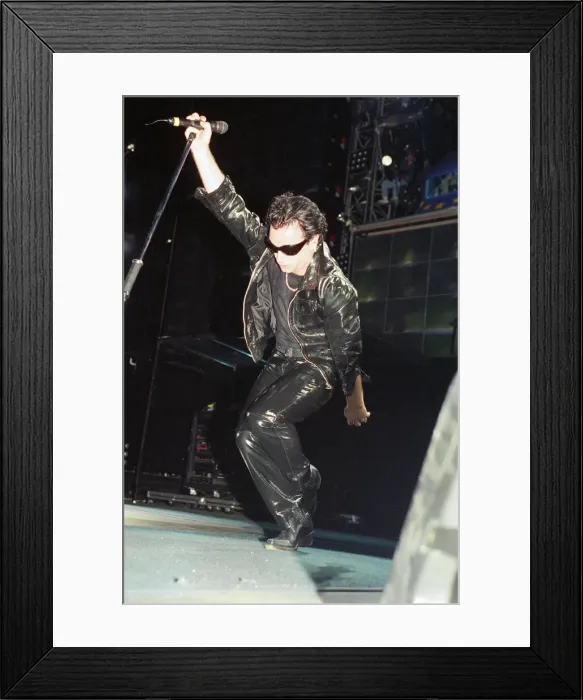 Framed Print : U2 in concert on the Zoo TV Tour, Wembley Stadium. Bono performing on stage Framed Print : U2 in concert on the Zoo TV Tour, Wembley Stadium. Bono performing on stage