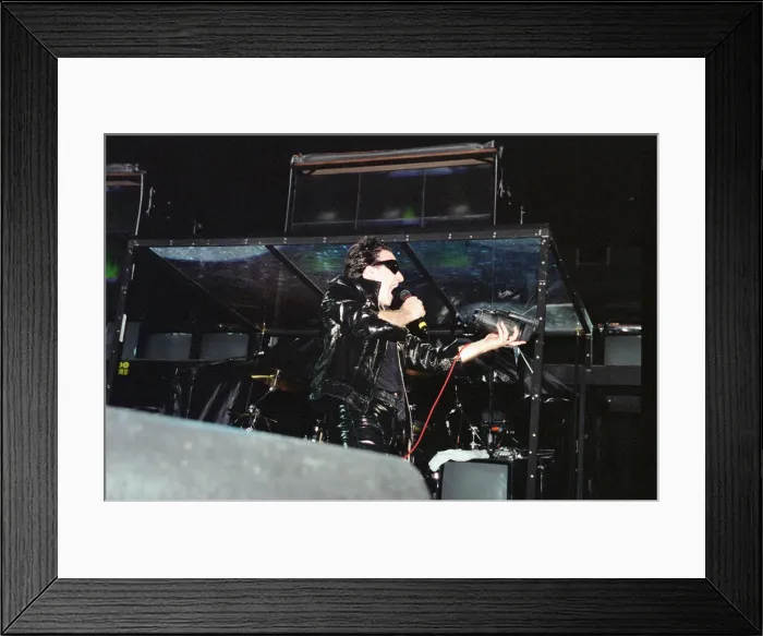 Framed Print : U2 in concert on the Zoo TV Tour, Wembley Stadium. Bono performing on stage Framed Print : U2 in concert on the Zoo TV Tour, Wembley Stadium. Bono performing on stage