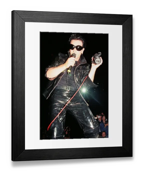 Framed Print : U2 in concert on the Zoo TV Tour, Wembley Stadium. Bono performing on stage Framed Print : U2 in concert on the Zoo TV Tour, Wembley Stadium. Bono performing on stage