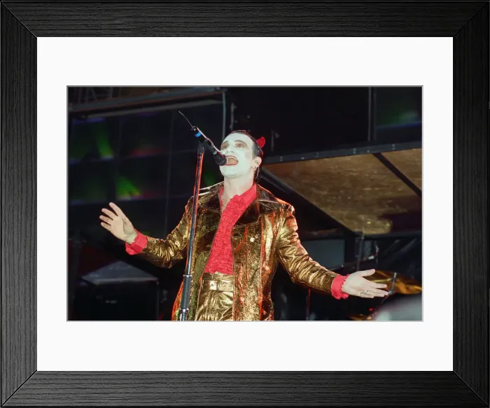 Framed Print : U2 in concert on the Zoo TV Tour, Wembley Stadium. Bono performing on stage Framed Print : U2 in concert on the Zoo TV Tour, Wembley Stadium. Bono performing on stage