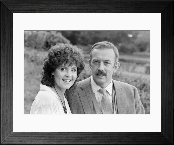 Framed Print : Pauline Collins and Roy Marsden on the set of The Black Tower'in Norfolk Framed Print : Pauline Collins and Roy Marsden on the set of The Black Tower'in Norfolk