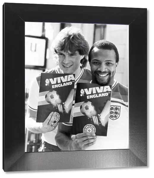 Glenn Hoddle (left) and Cyrille Regis (right) taking time off from preparing for