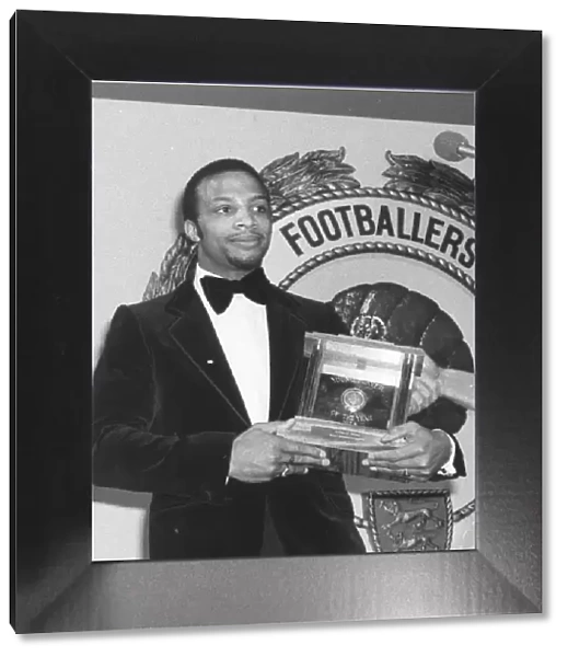 Cyrille Regis with his Young Player of the Year Award. Cyrille pipped his team-mate