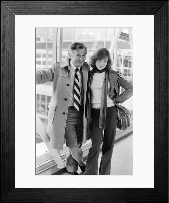 Framed Print : Film producer Bryan Forbes and actress Tatum O Neal leaving Heathrow Airport for