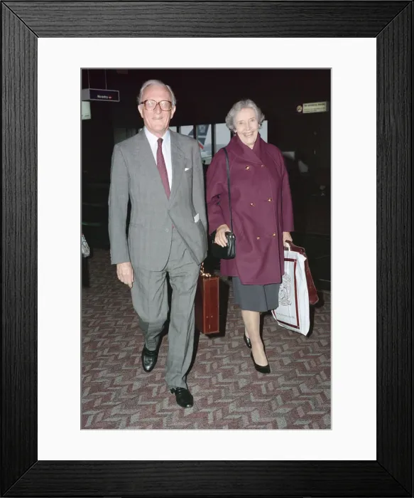 Framed Print : Lord and Lady Carrington arrive at Heathrow Airport, London. October 1991 Framed Print : Lord and Lady Carrington arrive at Heathrow Airport, London. October 1991