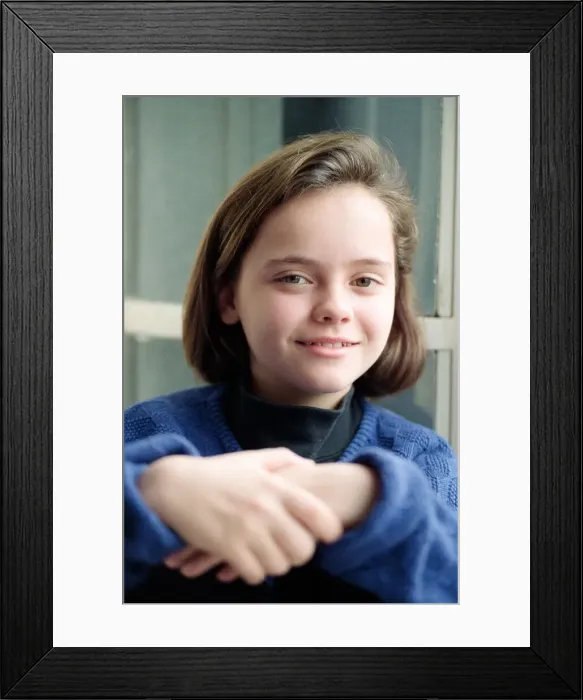 Framed Print : 11 year old Christina Ricci, junior star in the blockbuster movie Framed Print : 11 year old Christina Ricci, junior star in the blockbuster movie