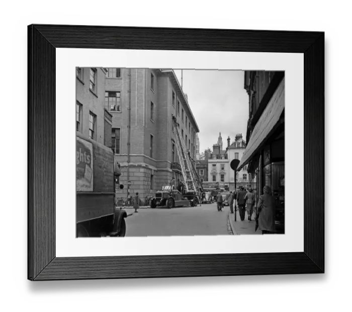 Framed Print : Flags fluttering in the breeze, decorations in traditional colours lining the streets Framed Print : Flags fluttering in the breeze, decorations in traditional colours lining the streets
