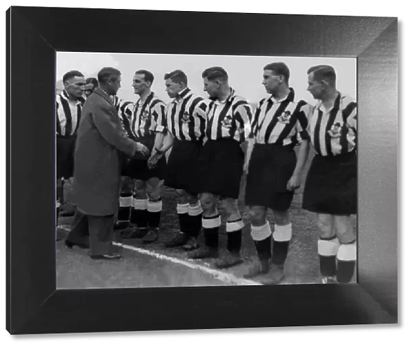 The Prince of Wales shaking hands with Newcastle United team