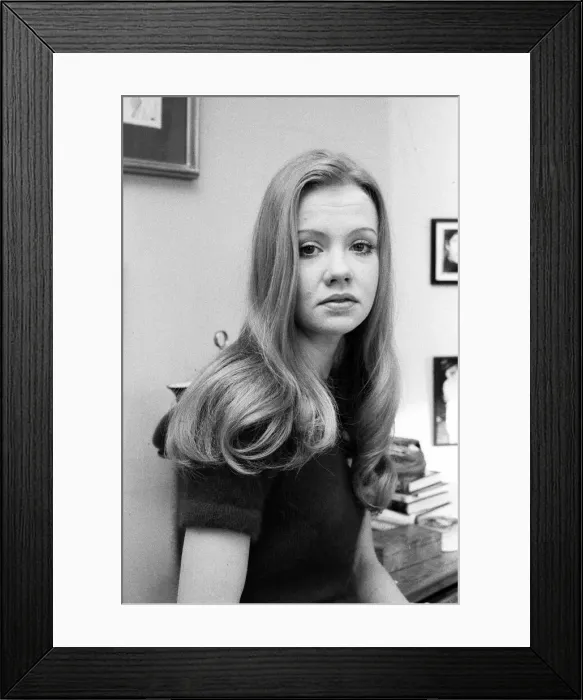 Framed Print : Actress Hayley Mills at her Chelsea home. A portrait of her by Roy Boulting hangs Framed Print : Actress Hayley Mills at her Chelsea home. A portrait of her by Roy Boulting hangs