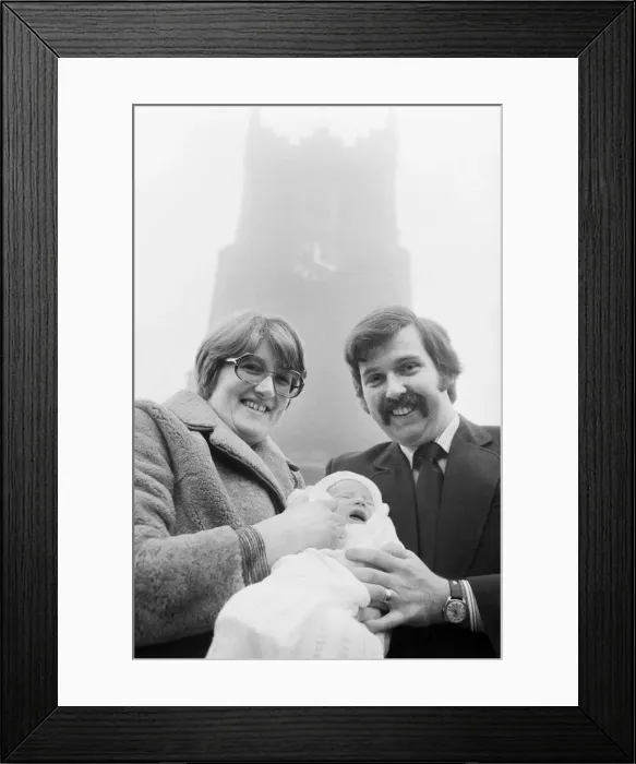 Framed Print : PC Graham Browne and his wife Yvonne pose with their eight week old baby son Clive Brown Framed Print : PC Graham Browne and his wife Yvonne pose with their eight week old baby son Clive Brown