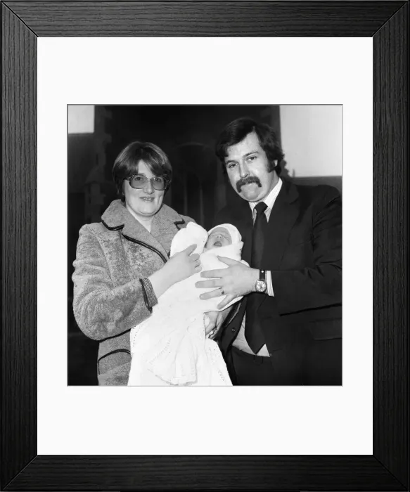 Framed Print : PC Graham Browne and his wife Yvonne pose with their eight week old baby son Clive Brown Framed Print : PC Graham Browne and his wife Yvonne pose with their eight week old baby son Clive Brown