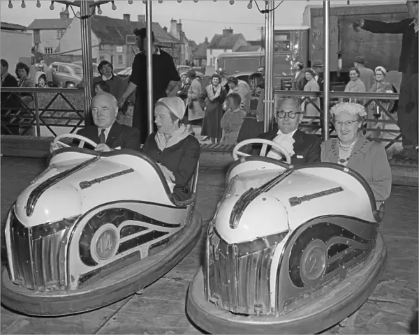 Mayor Leonard D. V. Wordingham and lady mayoress ride the dodgem cars at the Reach Fair