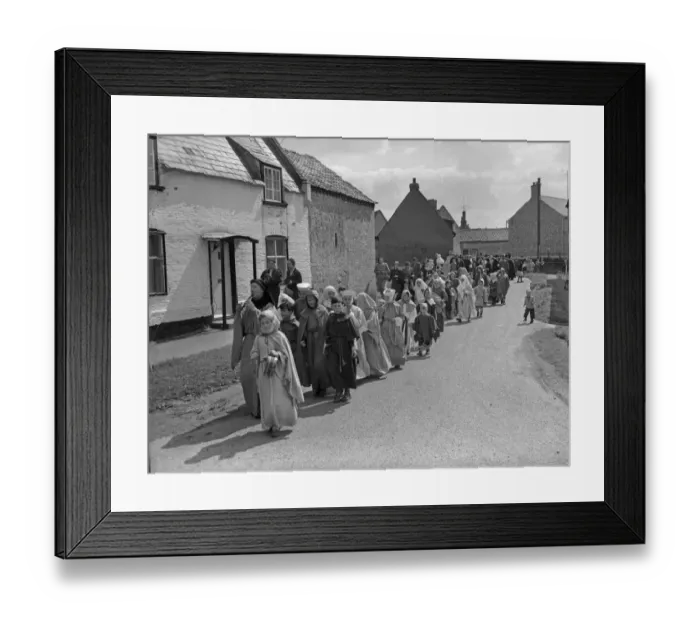 Framed Print : Children parade throughout the streets of Reach, dressed in medieval costumes for Framed Print : Children parade throughout the streets of Reach, dressed in medieval costumes for