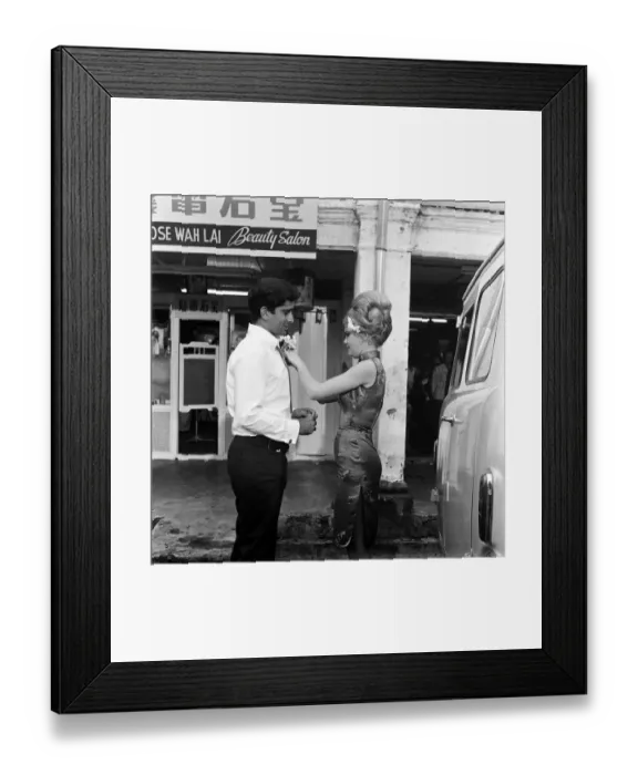 Framed Print : A new-look Hayley Mills in Chinese Make-up and a cheongsam on location in Singapore Framed Print : A new-look Hayley Mills in Chinese Make-up and a cheongsam on location in Singapore