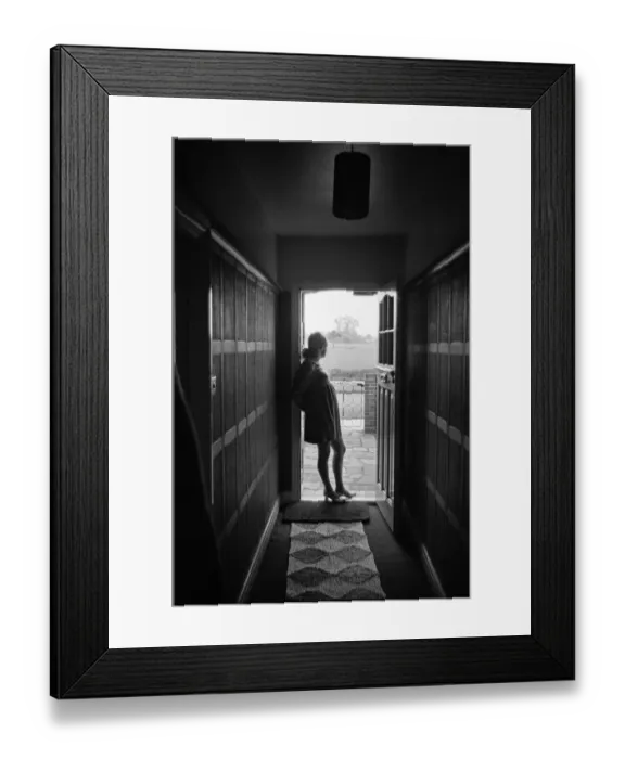 Framed Print : A pregnant woman standing in a doorway. 3rd May 1968