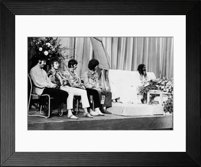 Framed Print : The Beatles with the Maharishi Yogi who is clutching bundles of flowers Framed Print : The Beatles with the Maharishi Yogi who is clutching bundles of flowers
