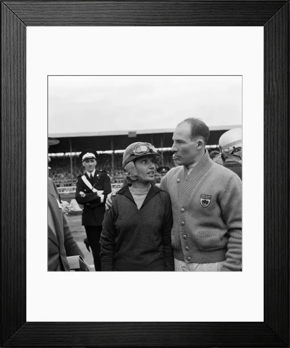 Framed Print : Motor racing at Silverstone. Stirling Moss expressing his sympathies to Maria Teresa de Framed Print : Motor racing at Silverstone. Stirling Moss expressing his sympathies to Maria Teresa de