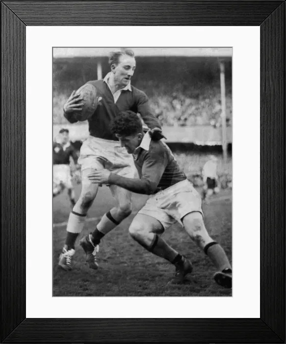 Framed Print : Lewis Jones avoids a tackle from Noel Henderson of Ireland at Landsdowne Road during Framed Print : Lewis Jones avoids a tackle from Noel Henderson of Ireland at Landsdowne Road during