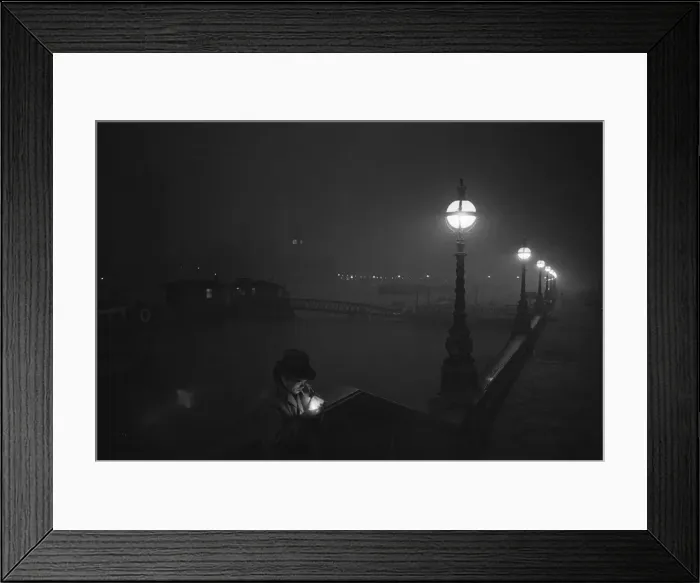 Framed Print : A man lights a cigarette on the Thames Embankment at night. Circa 1955 Framed Print : A man lights a cigarette on the Thames Embankment at night. Circa 1955