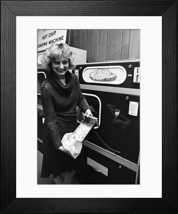Framed Print : The automatic Hot Chip Dispenser has arrived and is serving up chips fast in the pubs Framed Print : The automatic Hot Chip Dispenser has arrived and is serving up chips fast in the pubs