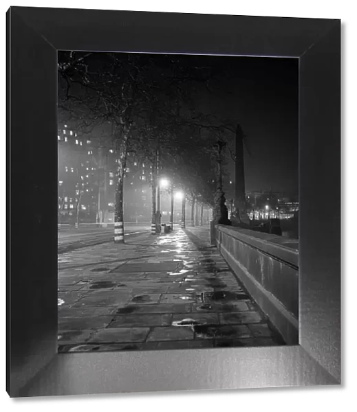 London Embankment at night. Circa 1955