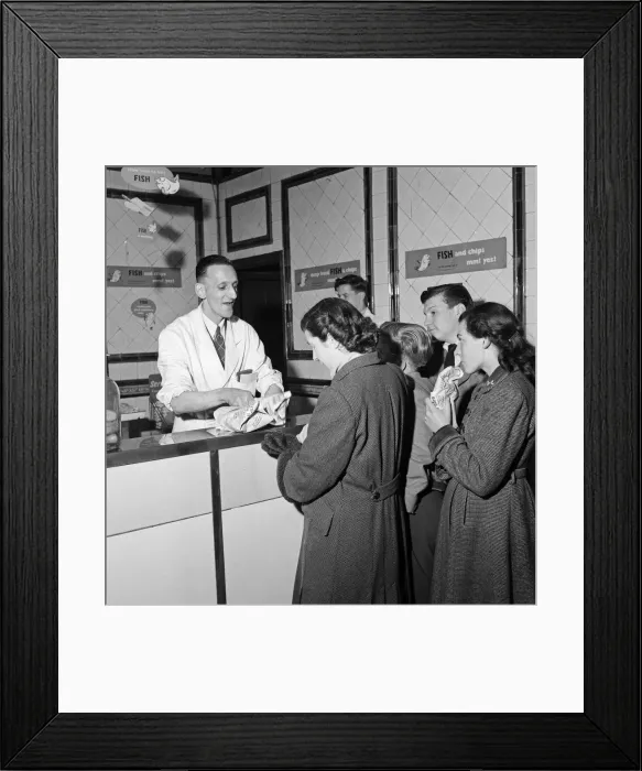 Framed Print : The Reverend Clifford L. Tillett removes his clerical collar every evening