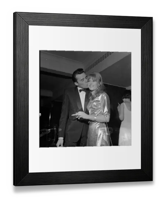 Framed Print : Julie Christie and Dirk Bogarde celebrate their film award win each