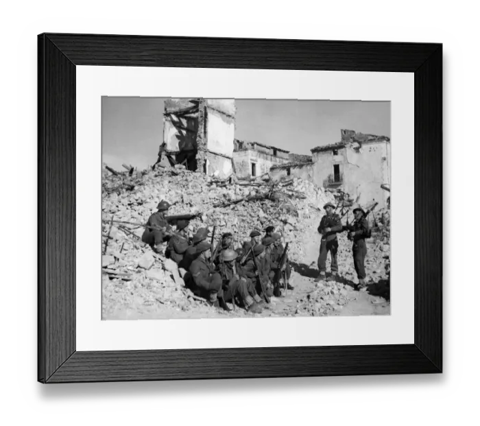 Framed Print : British army pipers of the 5th Army entertain their comrades in a heavily damaged village Framed Print : British army pipers of the 5th Army entertain their comrades in a heavily damaged village