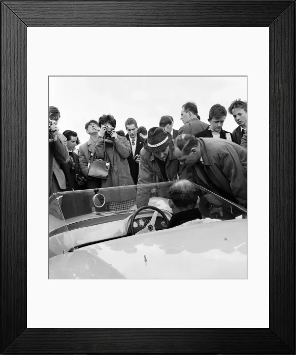 Framed Print : International 200 at Aintree motor circuit. Stirling Moss, in the car